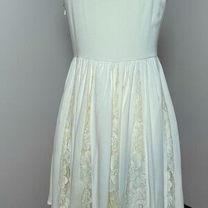 Lacey, off-white, and flirty? Sounds like a recipe for fun!
